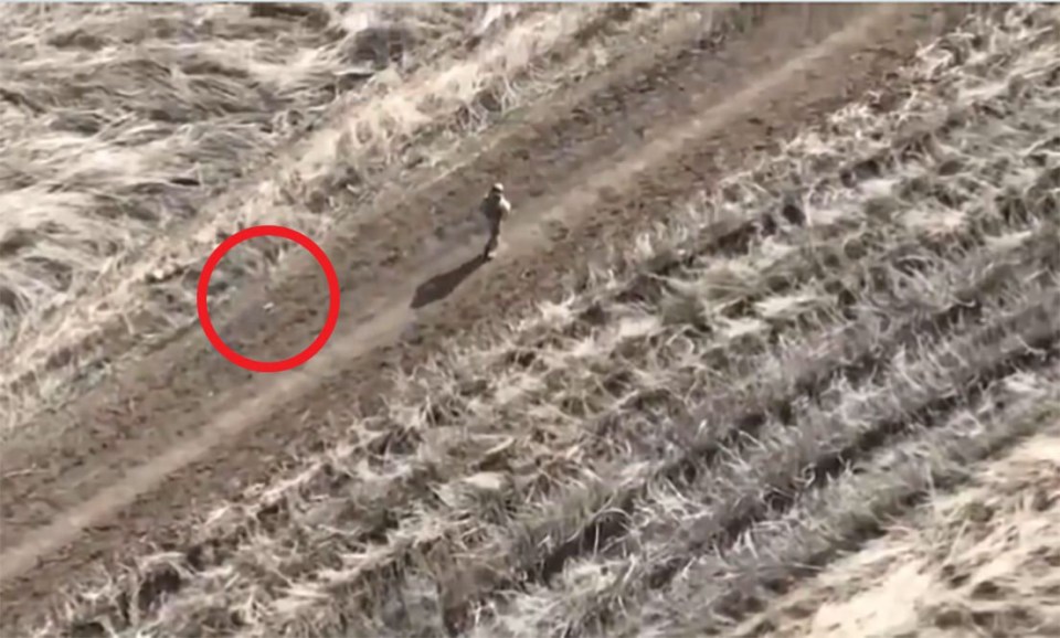 Moment Ukrainian kamikaze drone teases Putin soldier making futile attempt to flee on foot…before going in for the kill