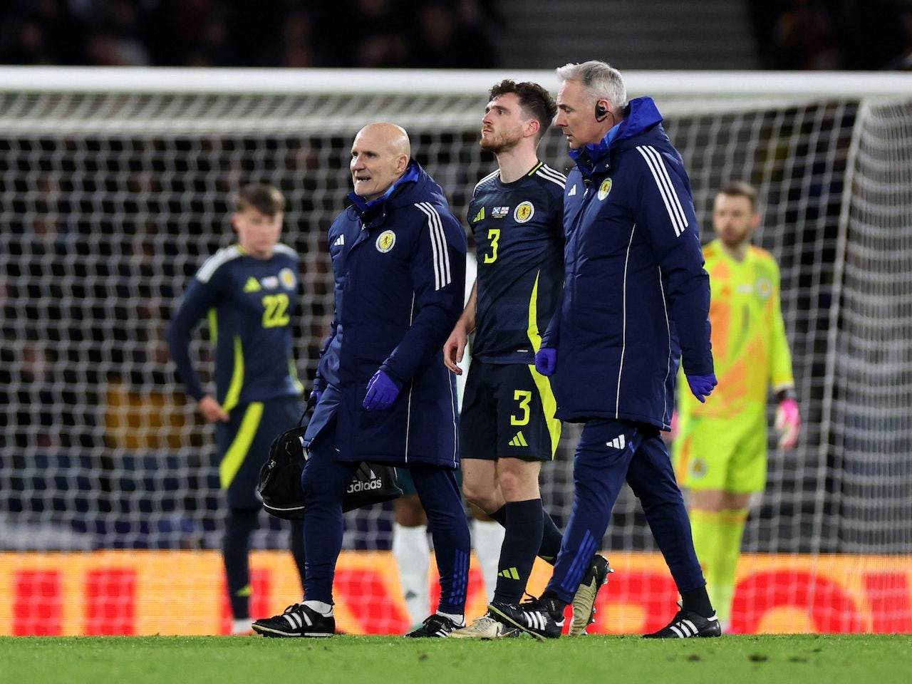Liverpool's Andrew Robertson forced off during Scotland clash