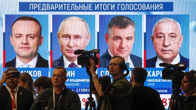 Putin laut Prognose Wahlsieger – Proteste in Bern und Genf